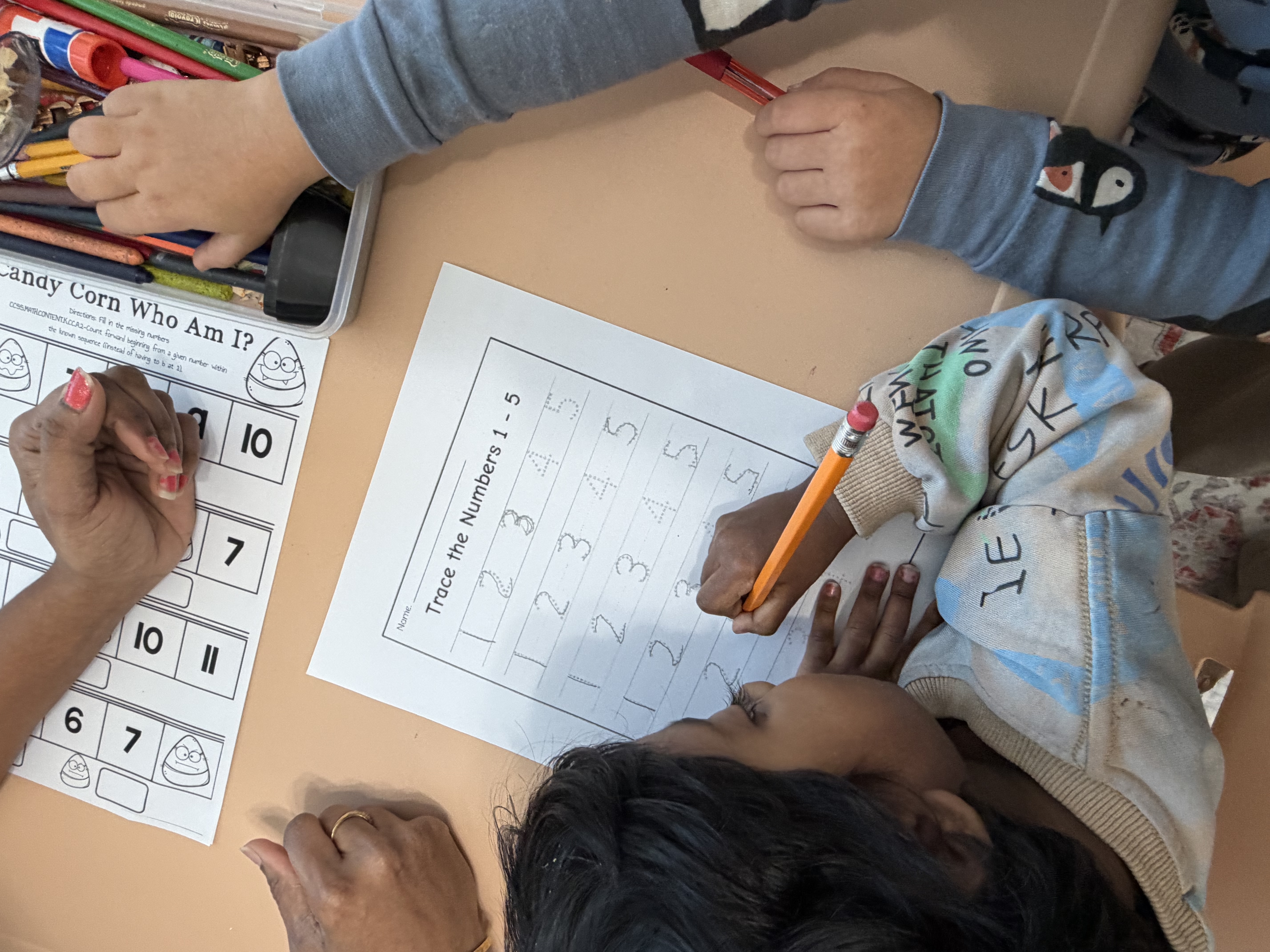 Children learning and playing at Devi Daycare